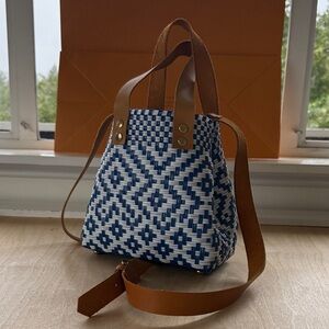 Elegant Blue and White Woven Tote with Tan Leather Straps
